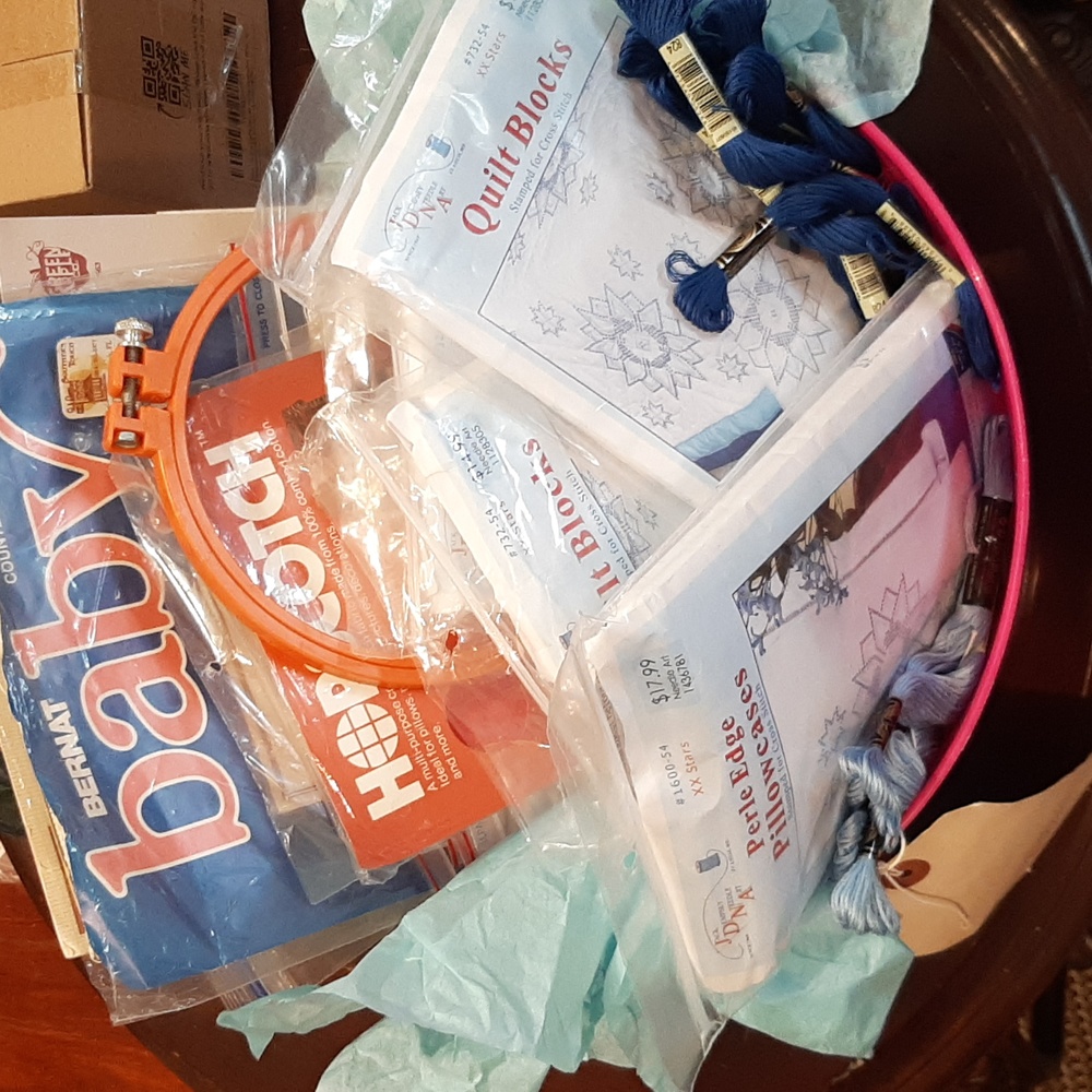 Basket full of cross stitch items